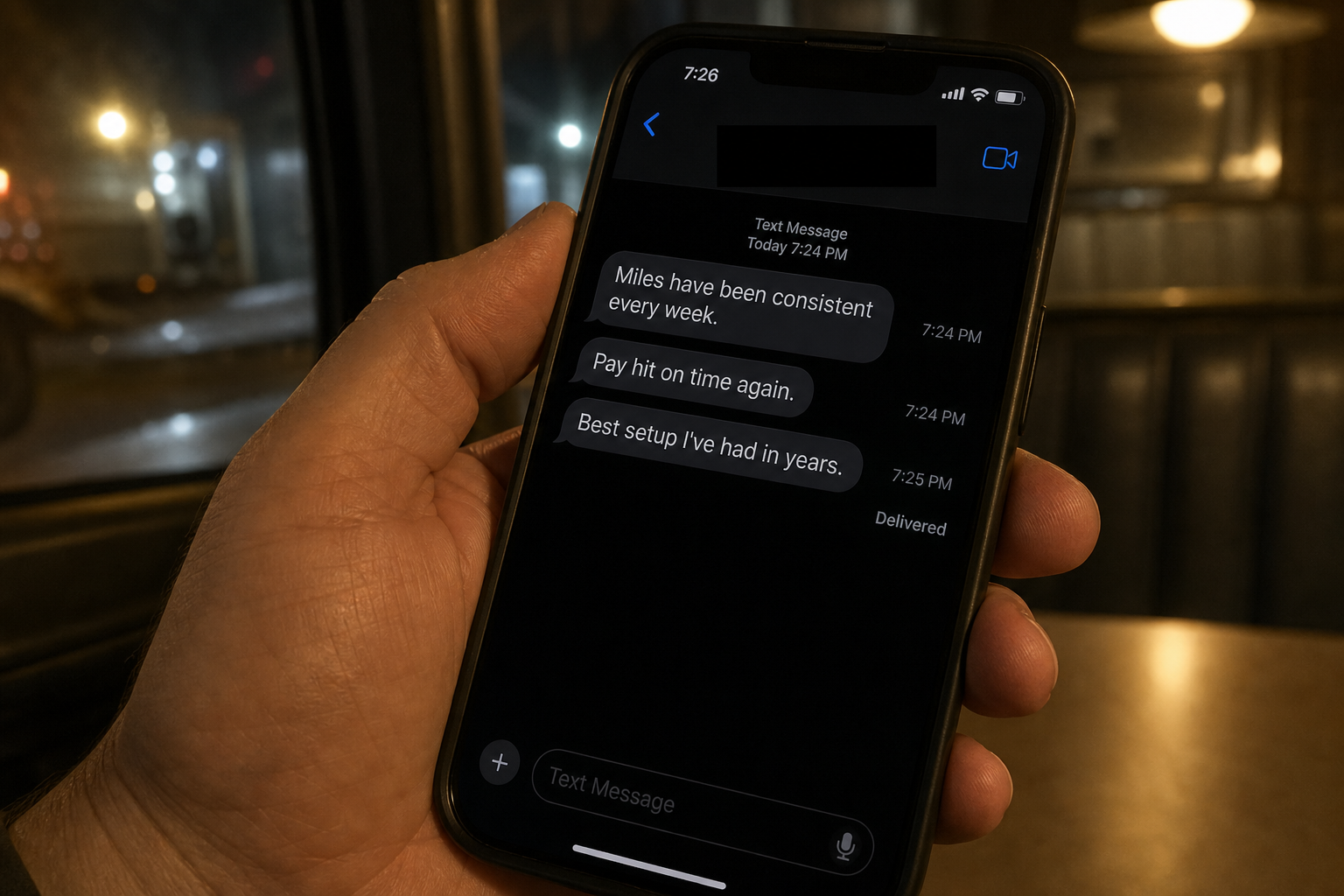 Text message from a driver about consistent miles and on-time pay.